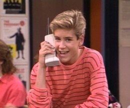 Zac from Saved by the Bell with his trademark old school cell phone